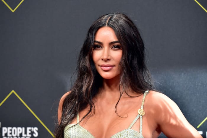 Kim Kardashian walks the red carpet at an event for the People's Choice Awards in 2019.
