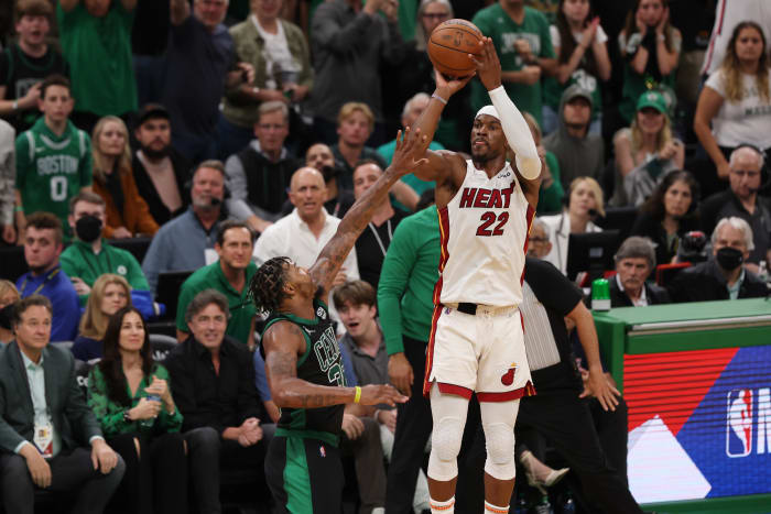 Jimmy Butler shooting a three-pointer at TD Garden.