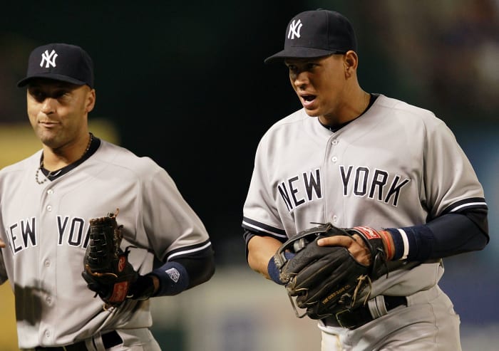 ARLINGTON, TX - APRIL 23: (LR) Derek Jeter and Alex Rodriguez #13 of the New York Yankees at Rangers Ballpark in Arlington on April 23, 2012 in Arlington, Texas.  (Photo by Ronald Martinez/Getty Images) 