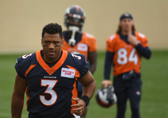Broncos quarterback Russell Wilson present for organized team activities.