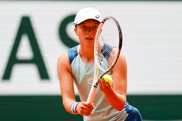 Iga Swiatek of Poland gets ready to serve at the French Open.