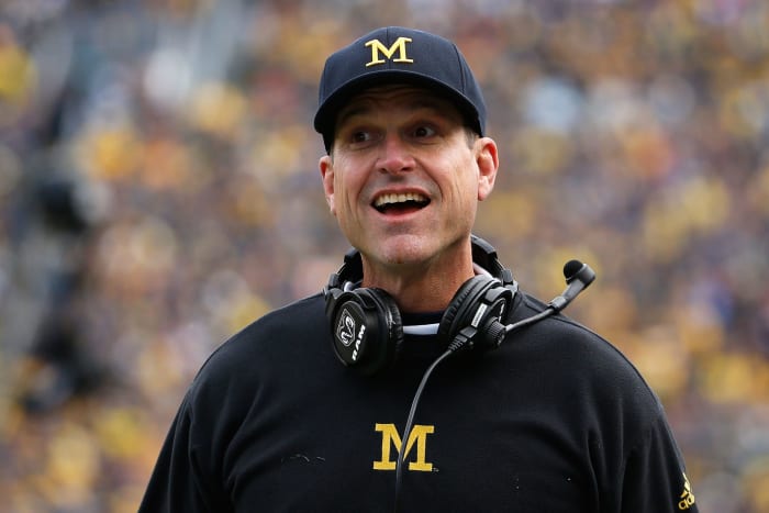 Head coach Jim Harbaugh of the Michigan Wolverines reacts during the college football game against the Michigan State Spartans at Michigan Stadium.