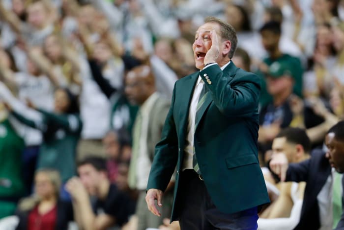 Tom Izzo coaching during a Michigan State basketball game.