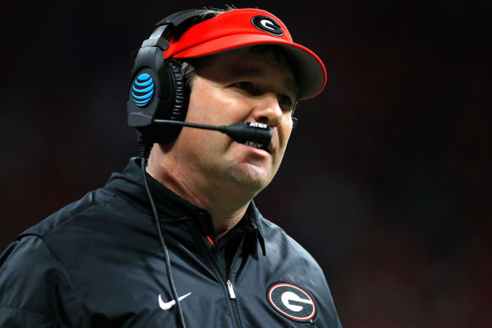 A closeup of Kirby Smart wearing a Georgia Bulldogs visor.