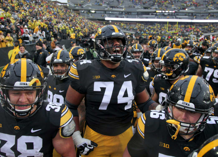 Iowa all-conference tackle Tristan Wirfs gets hyped up before a game with his Hawkeye teammates.