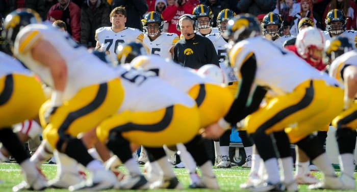 Kirk Ferentz watching his Iowa offense.