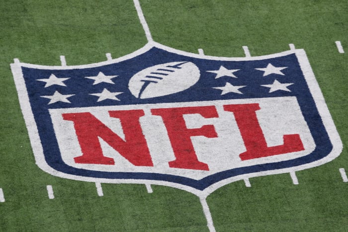 The NFL logo in the middle of Metlife Stadium.