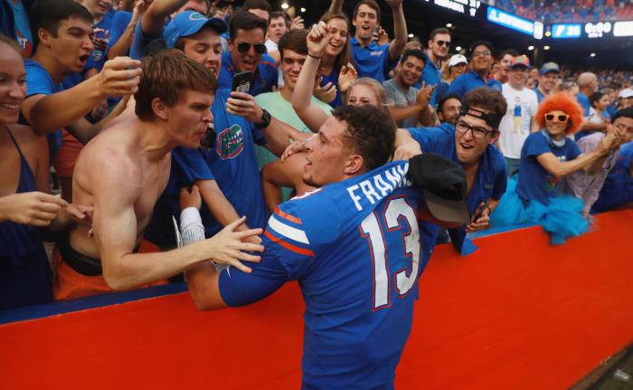 Florida Gators QB Feleipe Franks interacting with fans.