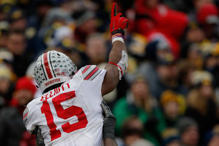 A closeup of Ezekiel Elliott celebrating during a football game.