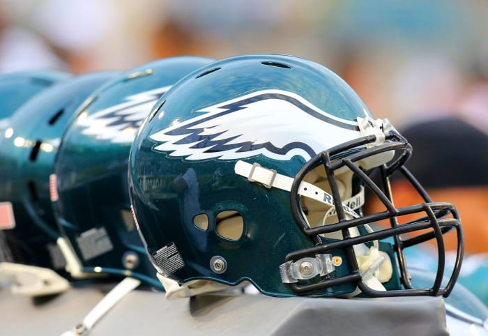 Eagles helmets on the sidelines.