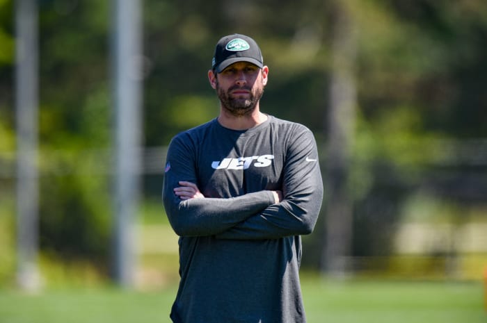 Adam Gase looks on at New York Jets practice.