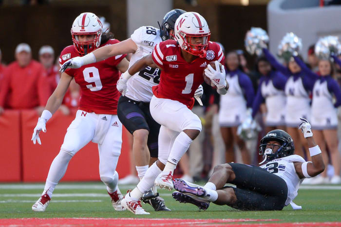 Wan'Dale Robinson runs the football for Nebraska.