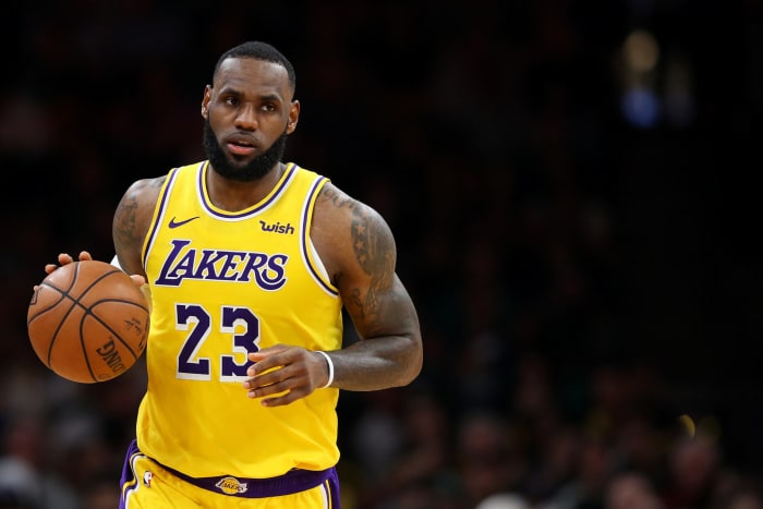 lebron james dribbles down the floor
