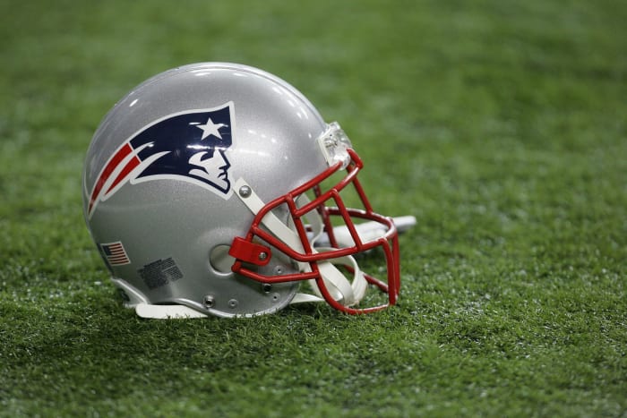 A closeup of a New England Patriots football helmet. The team will be without David Andrews in Week 3.