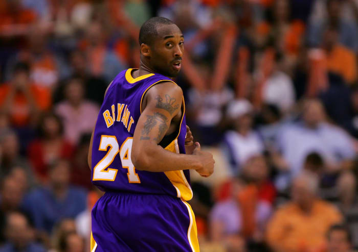 Kobe Bryant runs down the court during a Lakers game.