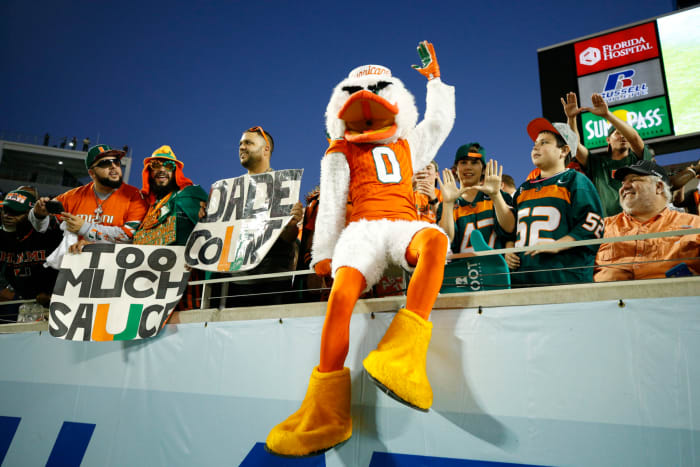 The Miami Hurricanes mascot interacting with fans.