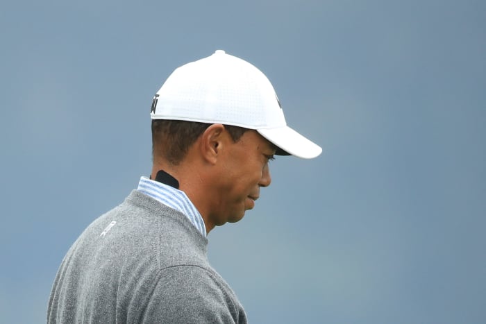 tiger woods wears neck tape