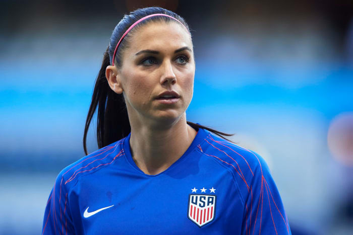USA soccer star Alex Morgan warms up.