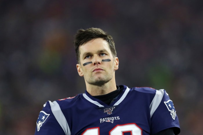 Tom Brady on the field during the Patriots' Wild Card loss to the Titans.