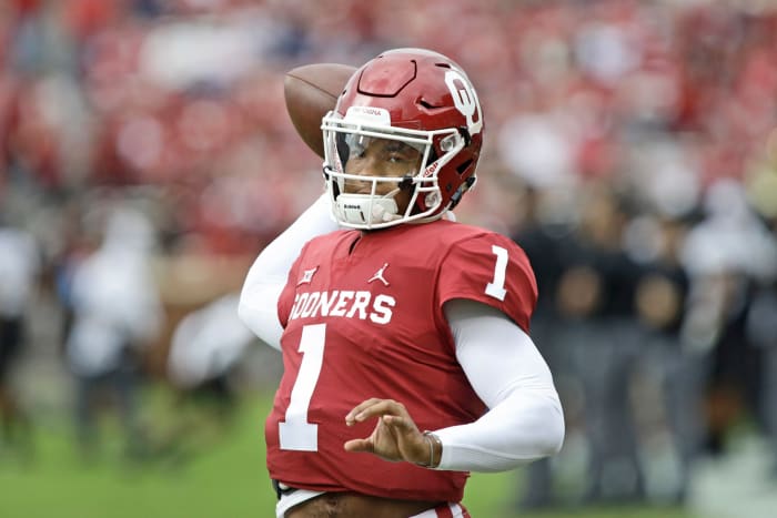 Kyler Murray throws a pass in warmups.