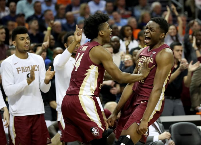 Terance Mann and Mfiondu Kabengele celebrate during ACC Tournament semifinal.