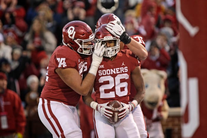 Kennedy Brooks of Oklahoma after a big play.
