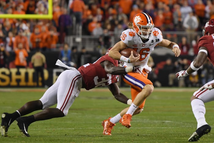 Dylan Moses tackles Trevor Lawrence.