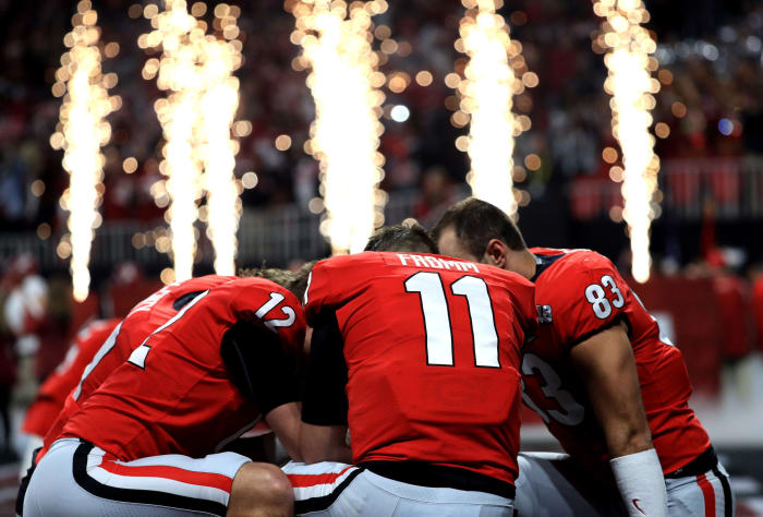 Jake From huddled up with his teammates before the National Championship game.