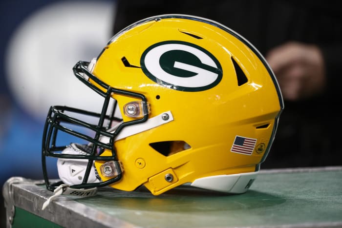 A closeup of a Green Bay Packers football helmet.