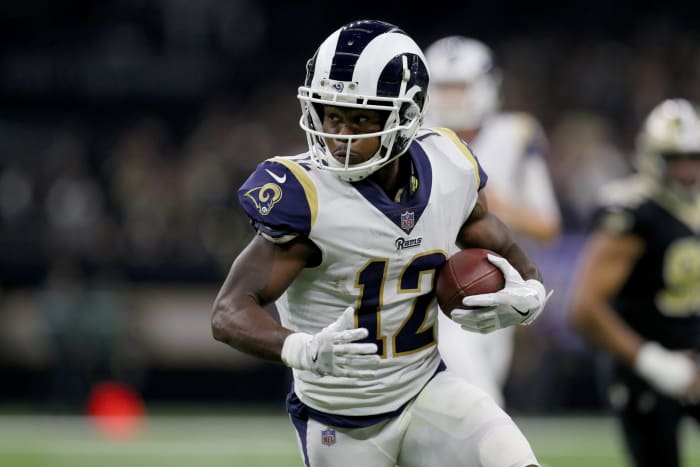 Brandin Cooks running with the football.