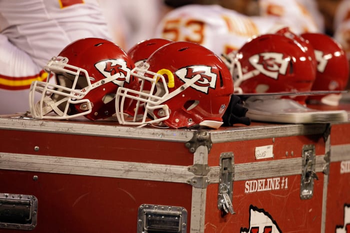 A picture of four Kansas City Chiefs helmets.