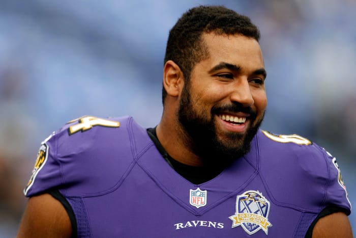 Baltimore Ravens lineman John Urschel without a helmet on.