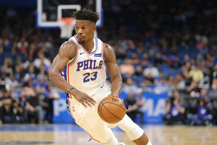 Jimmy Butler dribbling the ball.