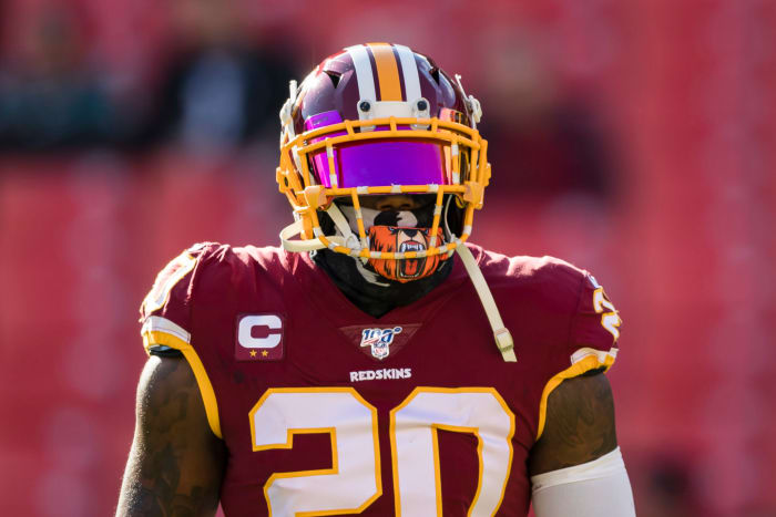 Landon Collins on the field before a game for the Washington Redskins.