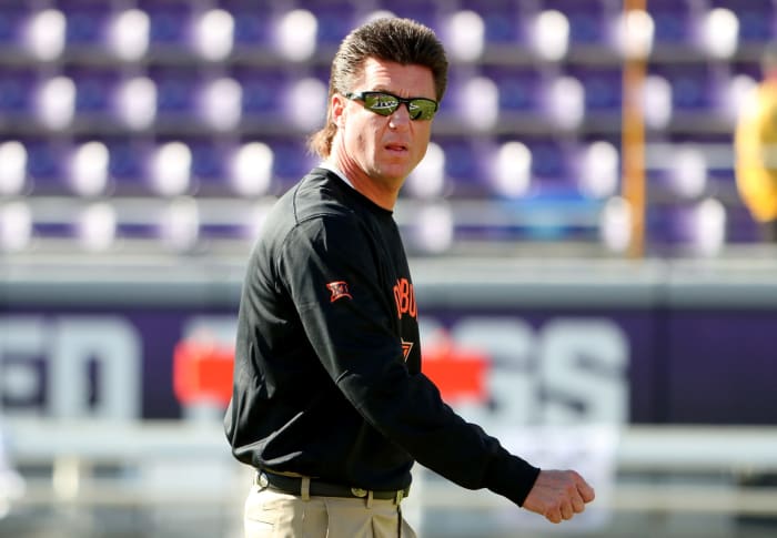 Oklahoma State head coach Mike Gundy wearing sunglasses.