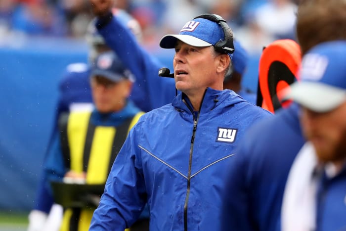 Giants coach Pat Shurmur looking on.