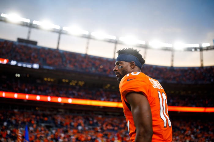 Emmanuel Sanders on the field before a Broncos' game.