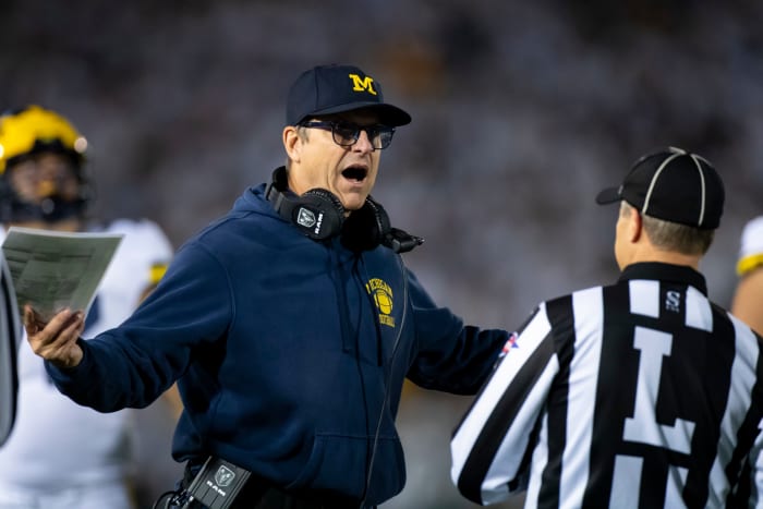 Michigan head coach Jim Harbaugh on the sideline against Penn State.