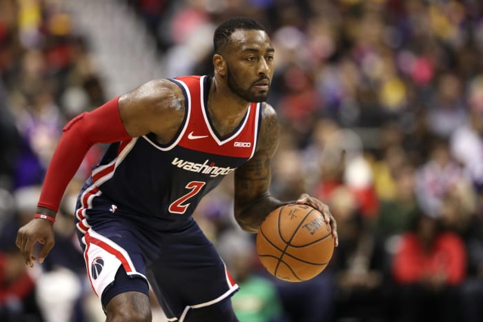 John Wall handling the ball during a game.