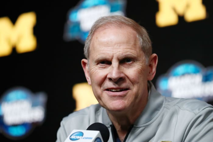 Michigan basketball head coach John Beilein speaking with the media during a press conference.