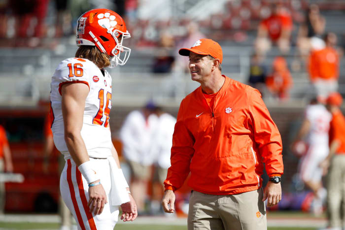 Dabo Swinney and Trevor Lawrence interact during Clemson's win over Florida State.