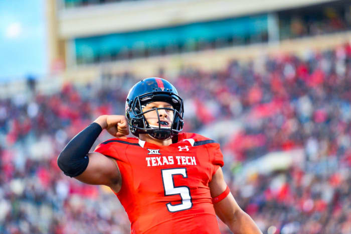 Patrick Mahomes flexing his Texas Tech football jersey.