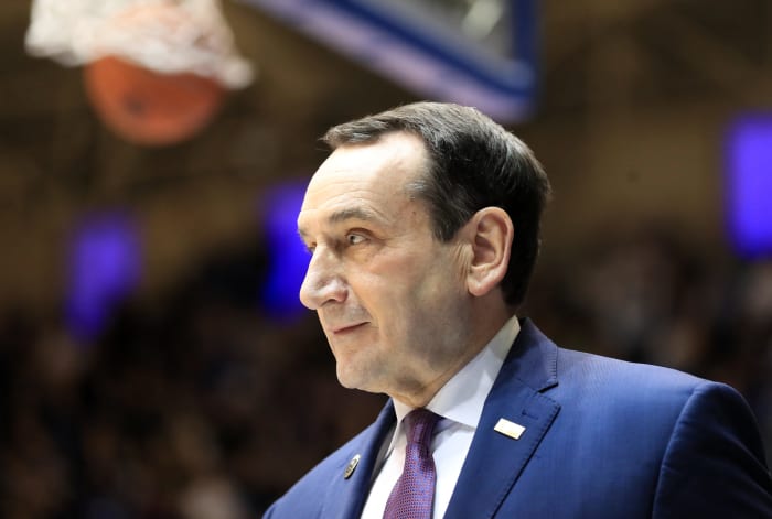 Coach K walks onto the floor during a Duke game.