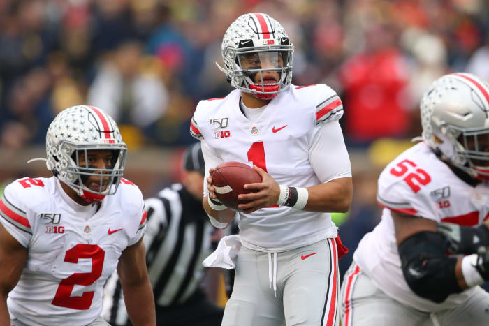 Justin Fields drops back for a pass against Michigan.