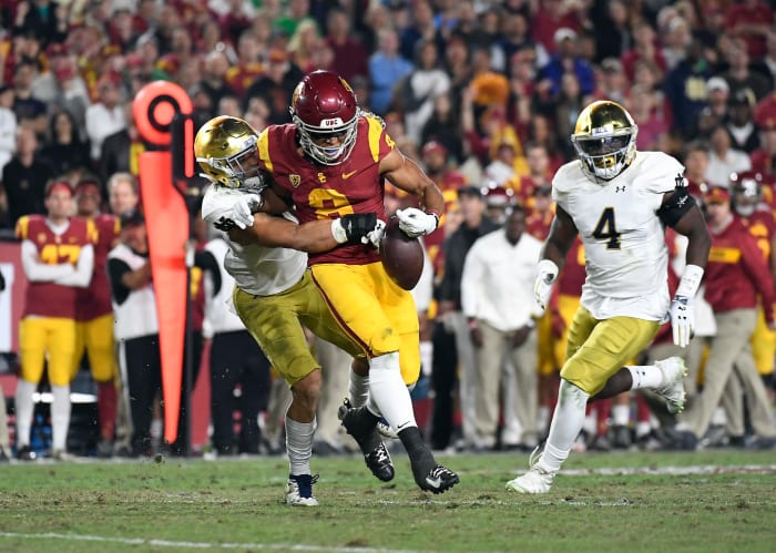 Notre Dame football's Alohi Gilman forces fumble vs. USC.