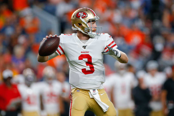 C.J. Beathard drops back to pass.