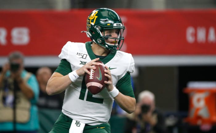 Charlie Brewer drops back to pass.
