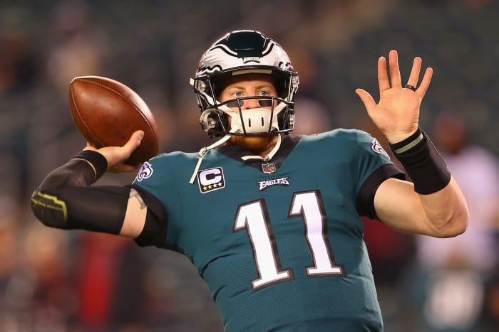A closeup of Carson Wentz throwing a pass during an Eagles game.