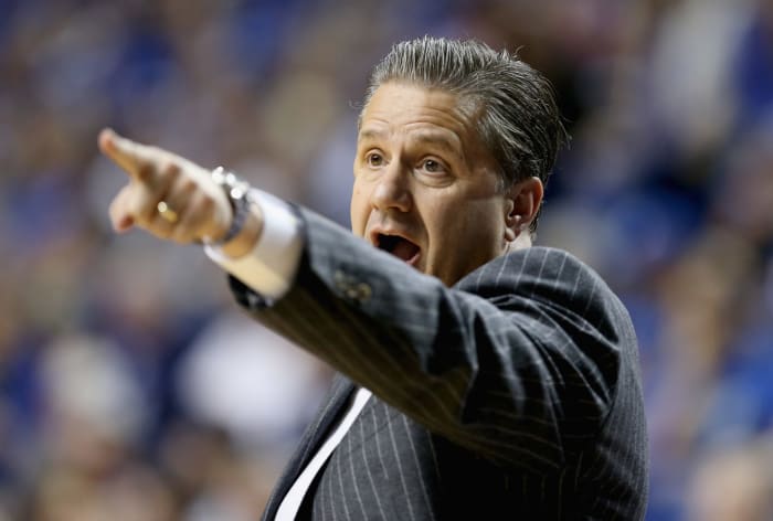 A closeup of Coach Cal pointing.
