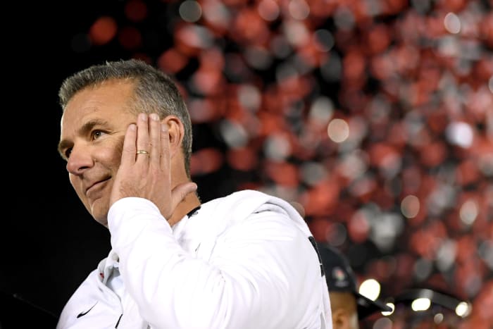 urban meyer smiles after winning the rose bowl